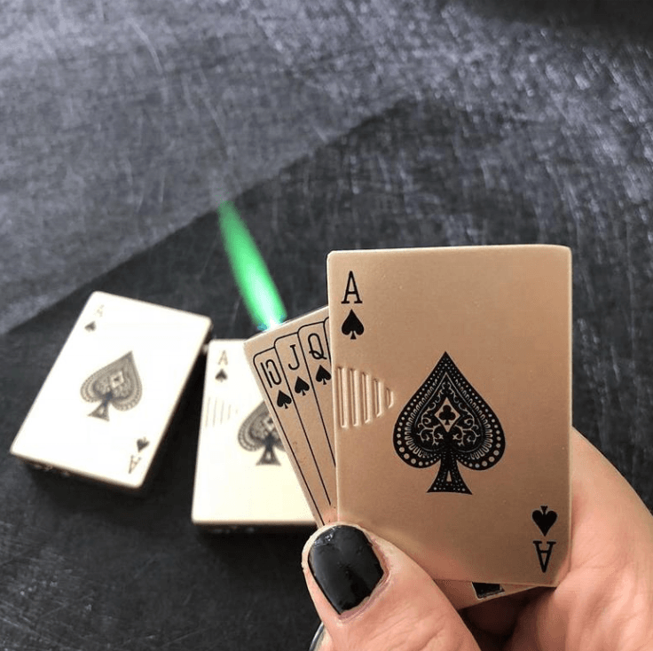Sleek miniature poker-themed lighter